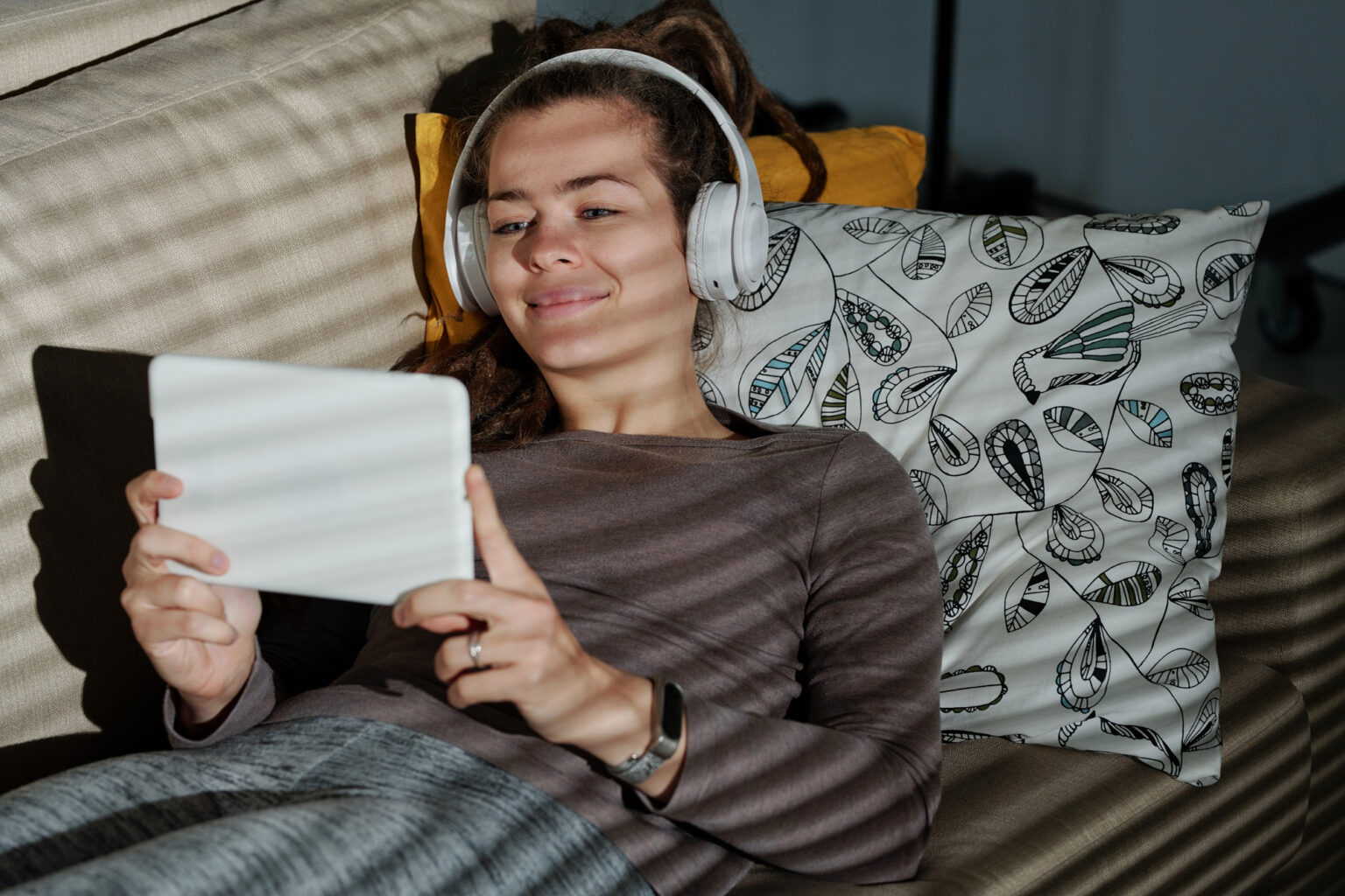 A young woman watching video content online